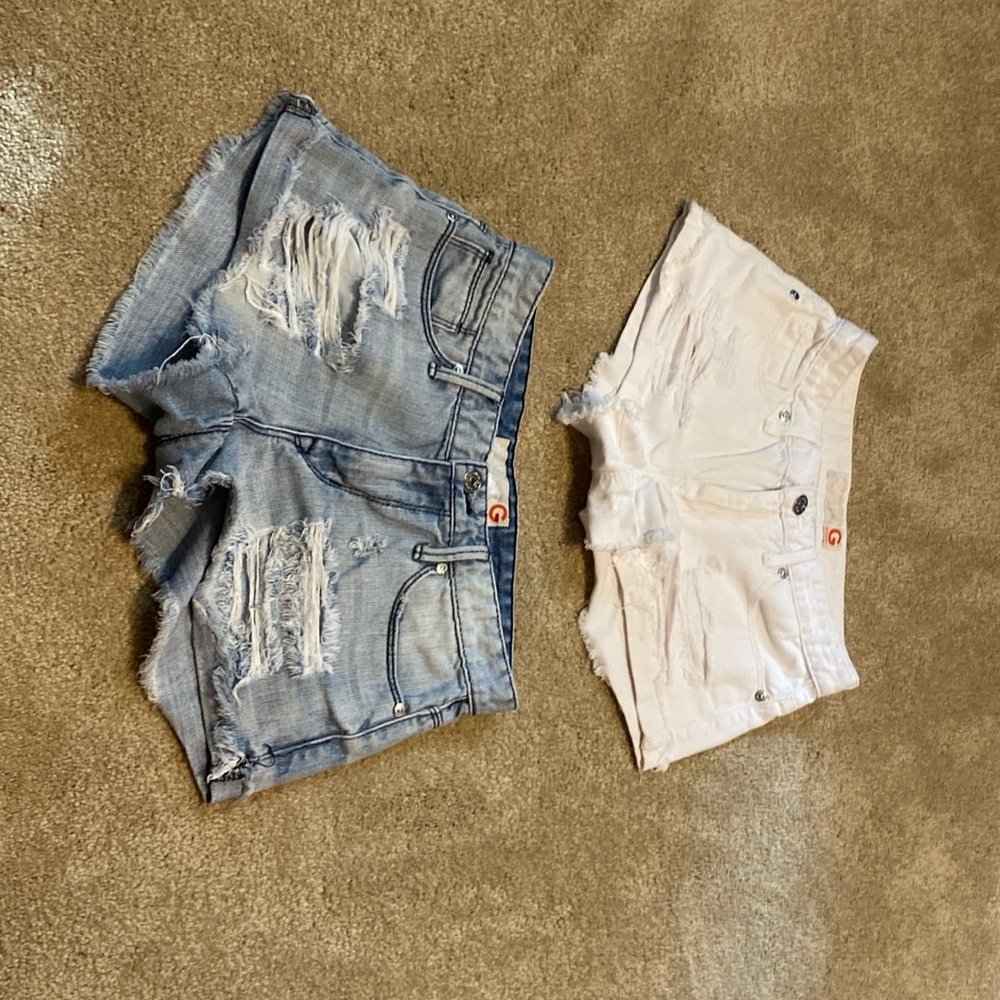 I am selling guess shorts and they are both small, no tags, and no stains.